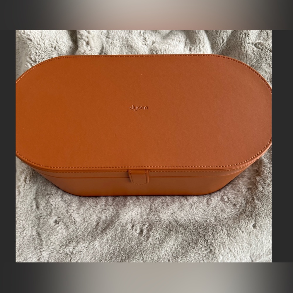 Dyson airwrap with case and all accessories.
